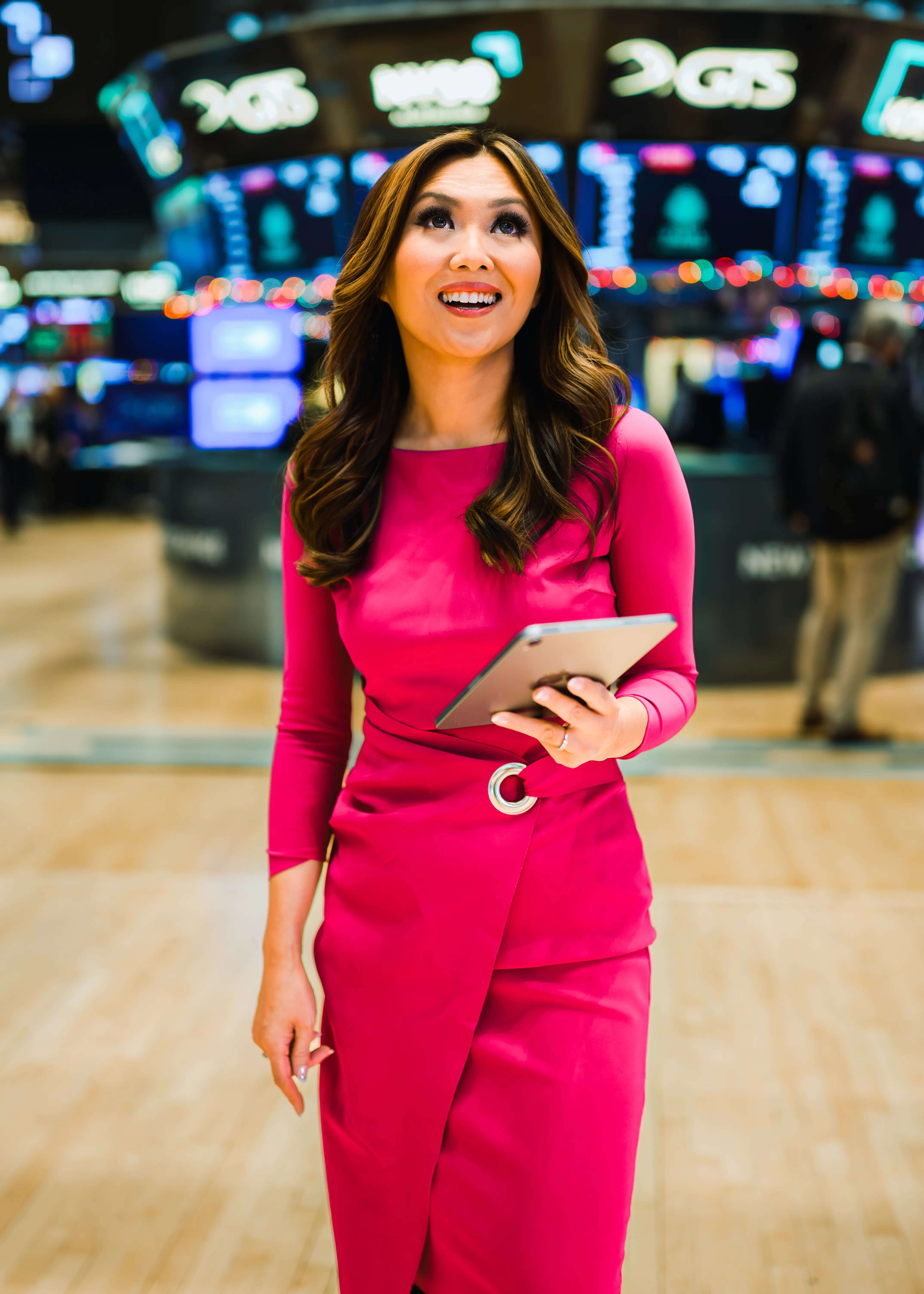 Remy Blaire on the NYSE trading floor, demonstrating her expertise as a financial journalist and speaker