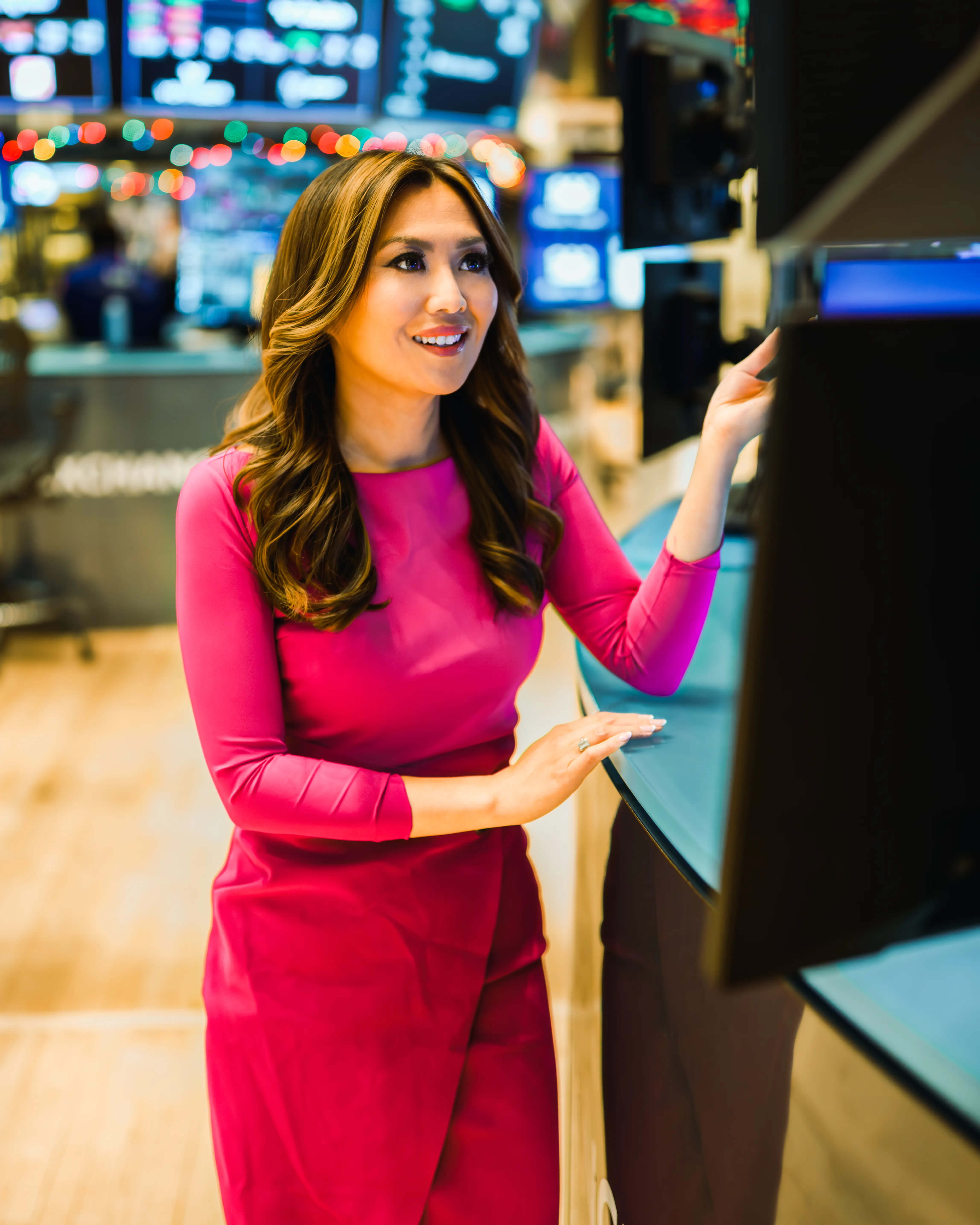 Remy Blaire delivering live financial market reporting at the NYSE